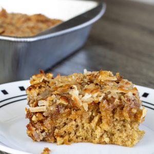 Oatmeal Cake with Coconut Pecan Topping features old fashioned oats. It is dense and moist and topped with a delicious ooey-gooey coconut pecan topping!