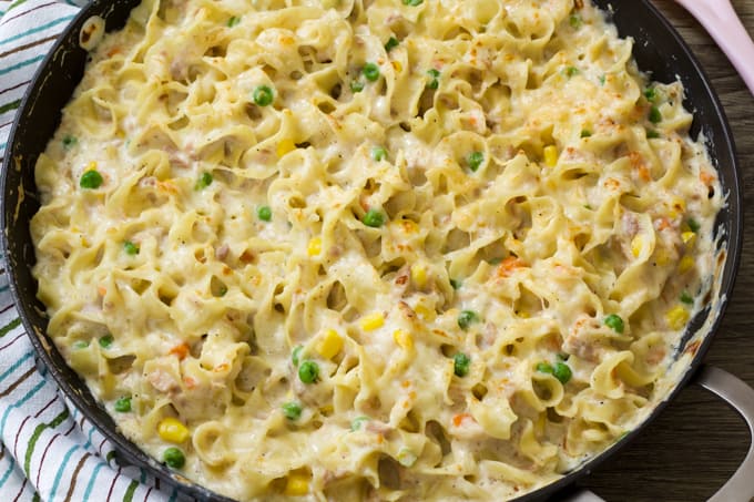 Overhead close up shot of a skillet of homemade tuna helper creamy pasta.