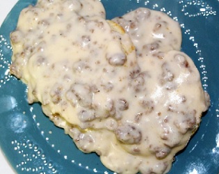 A traditional stick-to-your-ribs country sausage gravy that is easy to make and only requires sausage, milk, flour, canola oil and a little salt and pepper.