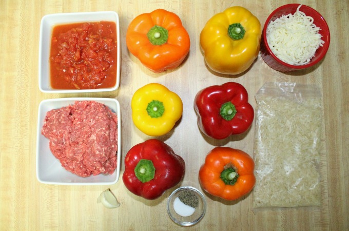 Stuffed Bell Peppers are flavorful and filling. It is an impressive dish that is easy to make. Ground beef, tomatoes and cheese give it great flavor. 