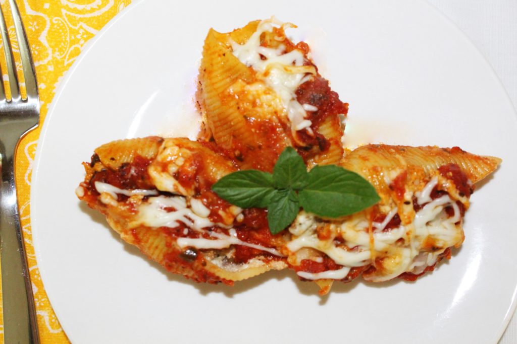Stuffed Pasta Shells combines large shell pasta, ground beef, sausage, ricotta cheese, Italian spices and jar sauce to make an easy and delicious meal. 