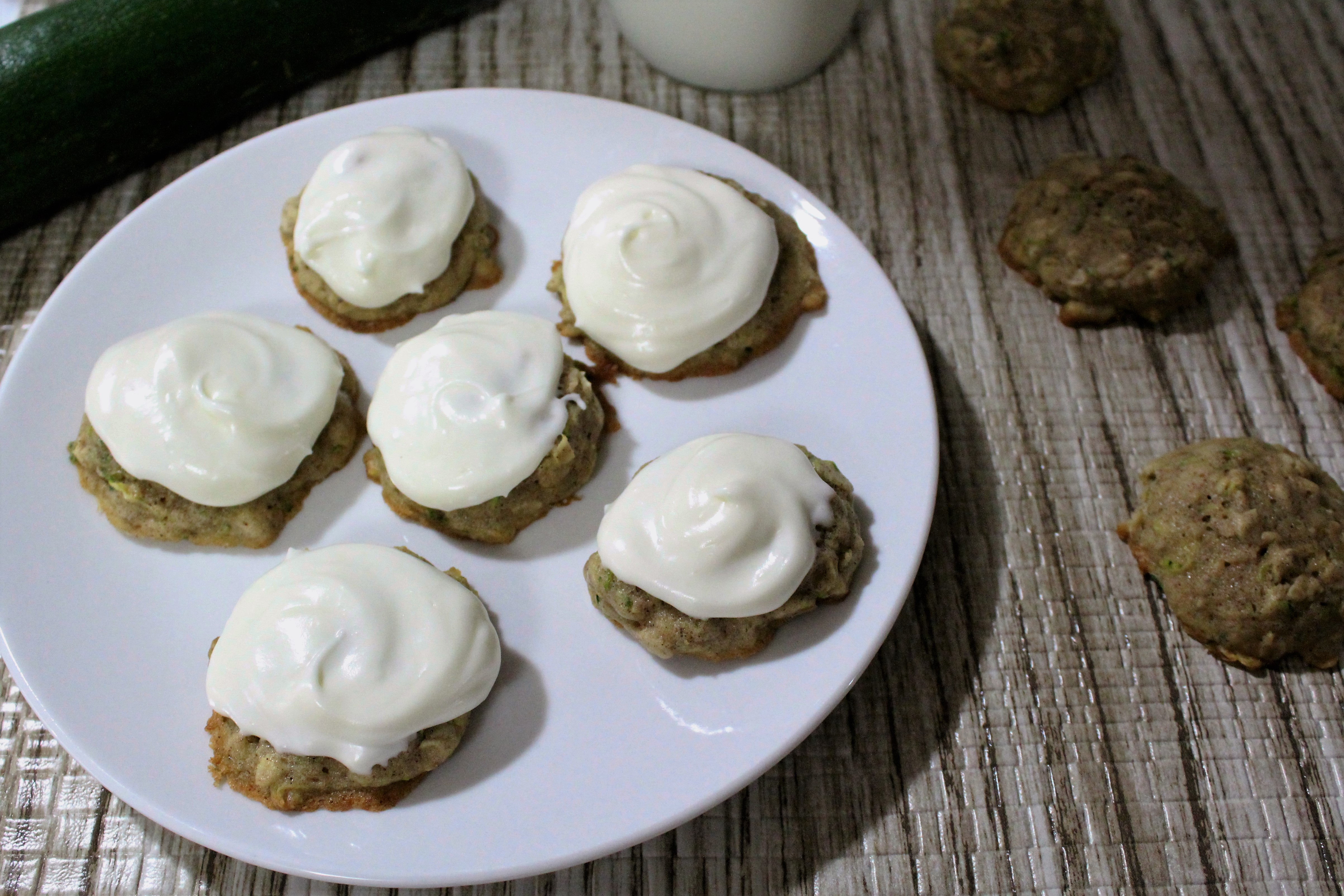 This is a delicious recipe for zucchini oatmeal cookies with cream cheese frosting. A great way to get the kids to eat zucchini!