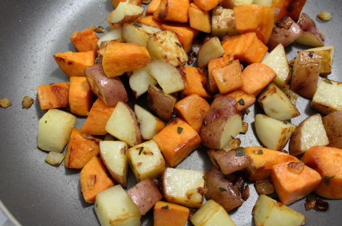 Round out any meal with this side dish of fried red potatoes, sweet potatoes, and beets that is delicious and packed with vitamins and high in fiber.