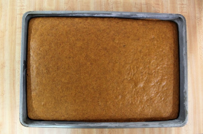 White flour combined with wheat flour as well as yogurt in the frosting make this recipe for Pumpkin Sheet Cake a little healthier than traditional recipes.