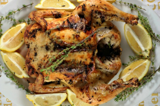 Lemon-Herb Roasted Chicken requires just a whole chicken, olive oil, lemon, herbs, garlic, salt and pepper, and is super easy and tastes delicious!
