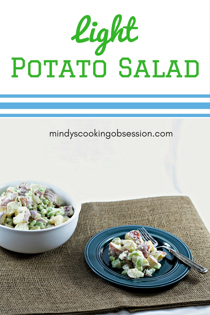Want a light potato salad recipe? This version combines red potatoes and onions, sweet pickles, celery, plain yogurt, mayo, and a little Dijon mustard.