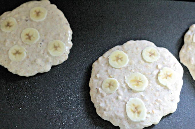 Oat Banana Nut Pancakes adds oats, wheat flour, bananas and walnuts to traditional pancake batter to make a heartier and healthier version of pancakes.