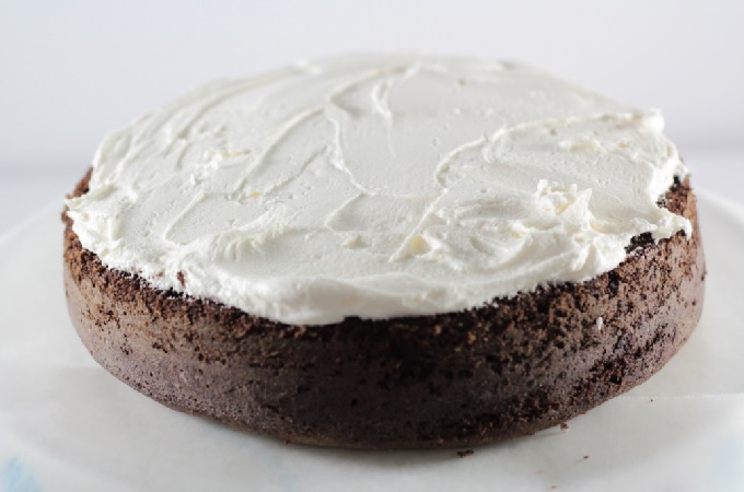Snoball Cake features a rich chocolate cake, decadent cream filling, vanilla frosting, coconut, and it tastes just like the popular snack cake.