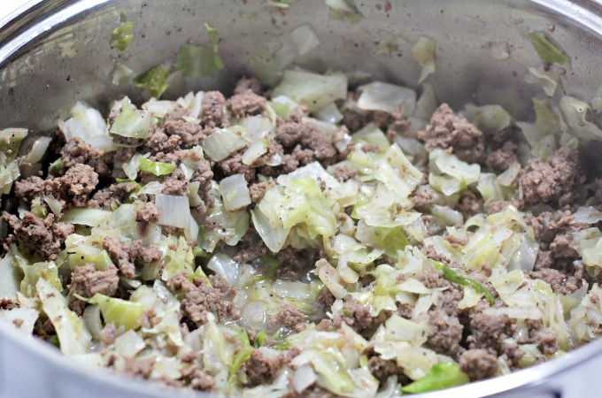 Bierocks are a soft yeast dough pastry sandwich filled with cabbage, ground beef, onion, and cheese. This dish is popular among the German community.