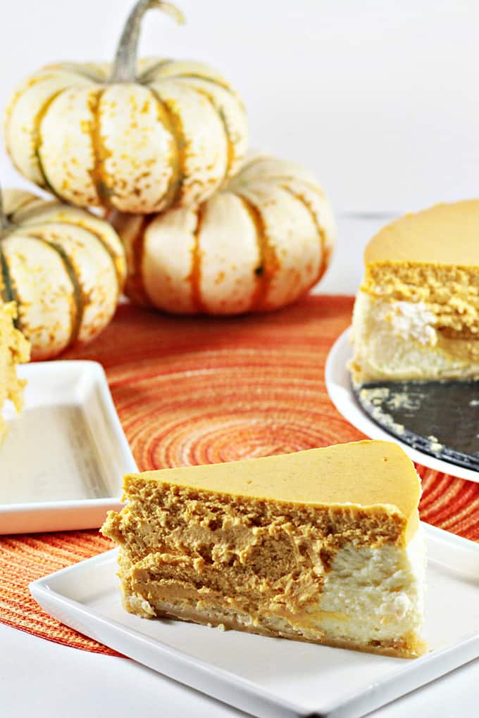 Pumpkin Layered Cheesecake has a shortbread crust with a layer of regular cheesecake and a layer of pumpkin cheesecake. So creamy and delicious!