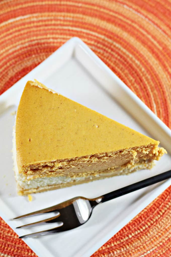 Pumpkin Layered Cheesecake has a shortbread crust with a layer of regular cheesecake and a layer of pumpkin cheesecake. So creamy and delicious!