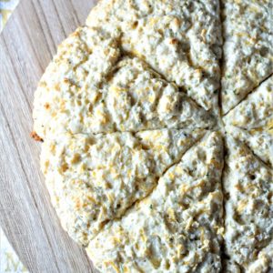 Cheese & Herbs Scones {Heart Smart} combine Bisquick, an egg, Greek yogurt, cheddar cheese, and dried herbs to make a fast and healthy addition to a meal.
