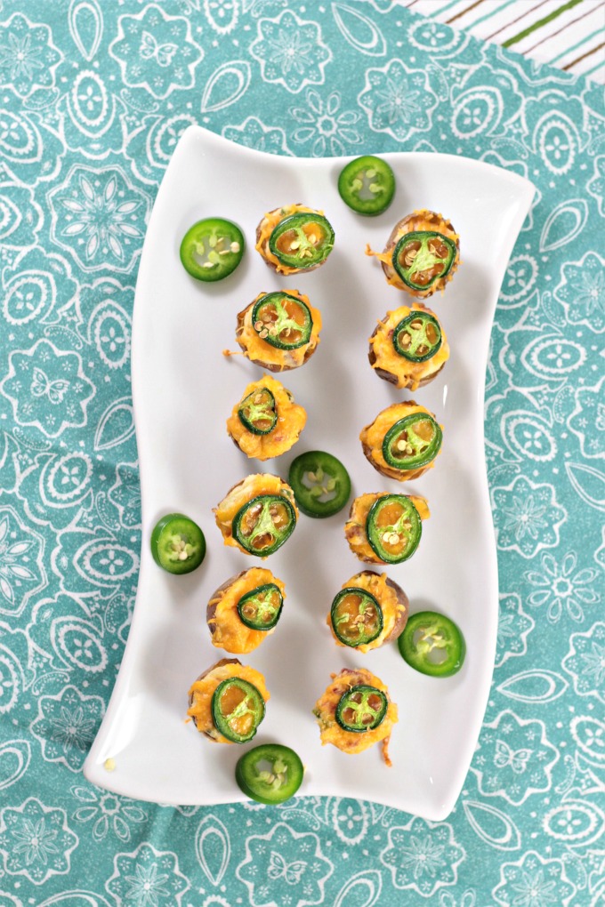  Jalapeno Potato Poppers feature jalapenos, cream cheese, bacon and cheddar cheese stuffed into a mini potato. Like twice baked potatoes. Just 5 ingredients!
