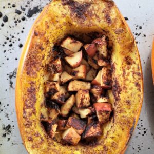 Roasted Spaghetti Squash & Apples has a touch of olive oil, brown sugar, cinnamon, and butter to make it the perfect side dish or dessert.