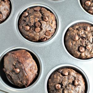Double Chocolate Banana Oatmeal Muffins have oats, cocoa, buttermilk, applesauce, and chocolate chips. They are chocolatey, moist, easy, and quick.