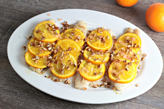 Pan Fried Fish with Oranges and Pecans features white fish, shallots, white wine vinegar, orange juice, and butter. A quick, easy, and healthy dish. 