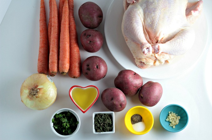 Roasted Chicken, Potatoes, & Carrots: Whole chicken, red potatoes, carrots, onion, olive oil, thyme, and parsley is all you need to make this meal in a pan!