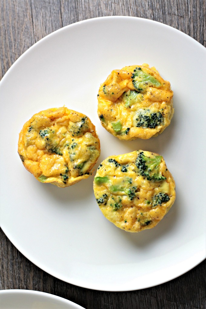 Broccoli Cheddar Egg Cups combine broccoli, cheese, eggs, salt, pepper, and a splash of milk to make an easy breakfast, brunch, lunch, or even dinner! 