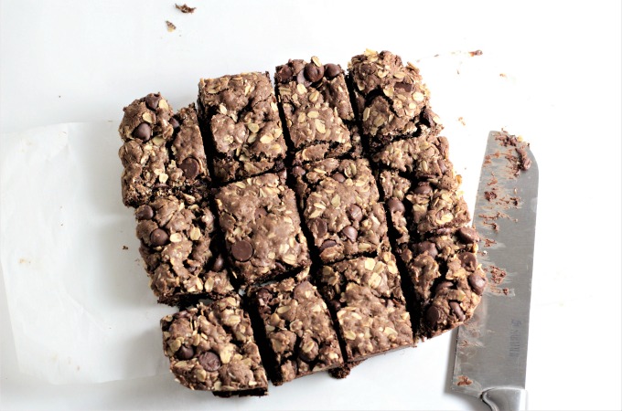 Chocolate Chocolate Chip Oatmeal Bars feature cocoa, oats, and chocolate chips to make this rich, dense and delicious cookie bar. 