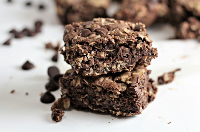 Chocolate Chocolate Chip Oatmeal Bars feature cocoa, oats, and chocolate chips to make this rich, dense and delicious cookie bar. 
