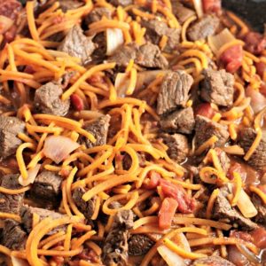 Skillet Beef Tagine with Spiralized Butternut Squash combines beef, shallots, tomatoes, spiralized butternut squash and spices to make a healthy dish.