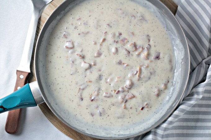 Bacon Gravy (Country Gravy) only requires 5 ingredients. Bacon, fat, flour, milk, salt and pepper is all you need to make this classic comfort food!