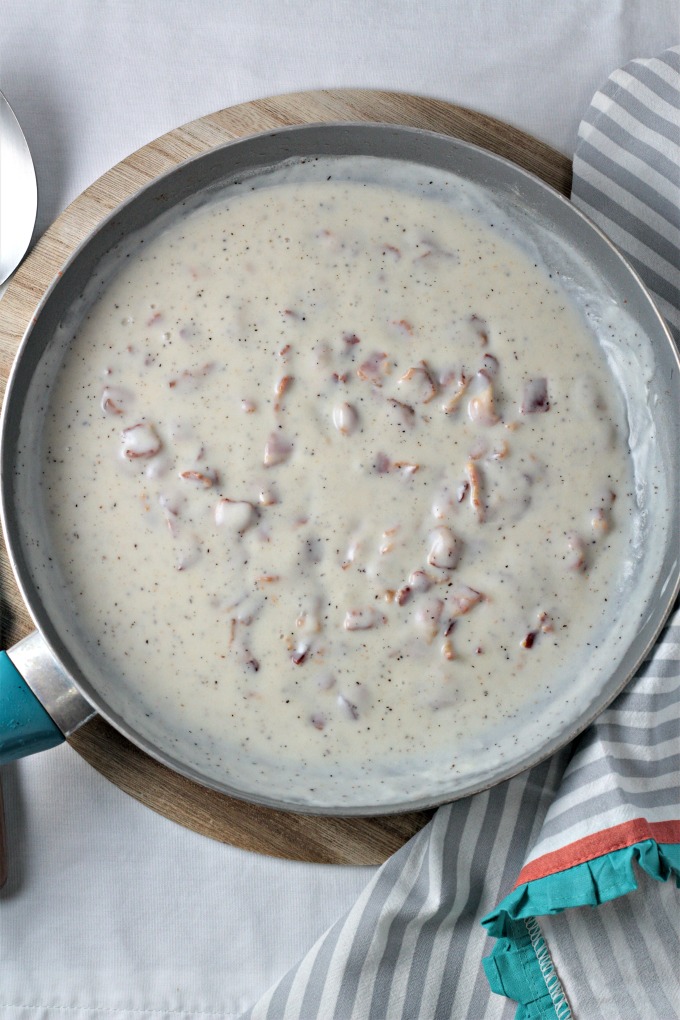 Bacon Gravy (Country Gravy) only requires 5 ingredients. Bacon, fat, flour, milk, salt and pepper is all you need to make this classic comfort food!