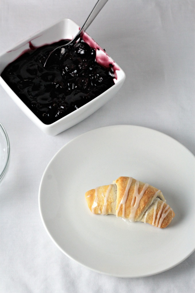 Blackberry Crescent Roll Turnovers are so yummy! All you need is store bought crescent rolls, pie filling, powdered sugar and milk to make this easy treat.