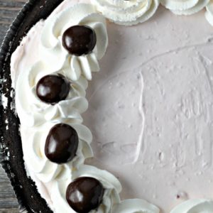 Cherry Yogurt No Bake Pie combines Greek yogurt, cream cheese, powdered sugar, and whipped topping in a chocolate crust. A healthier version of pie!