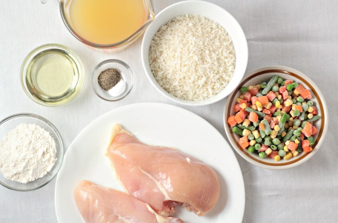 Chicken Rice Vegetable One Pan Dinner combines chicken breasts, broth, rice, and frozen mixed vegetables and is so fast it can be ready in about 25 minutes!