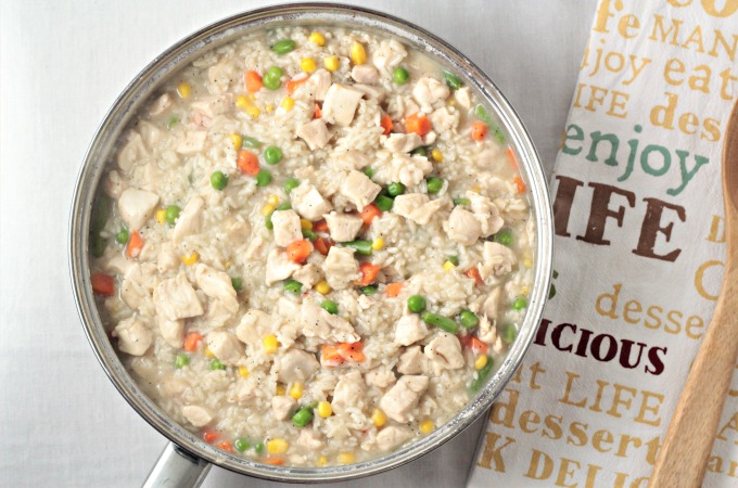 Chicken Rice Vegetable One Pan Dinner combines chicken breasts, broth, rice, and frozen mixed vegetables and is so fast it can be ready in about 25 minutes!