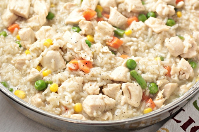 Chicken Rice Vegetable One Pan Dinner combines chicken breasts, broth, rice, and frozen mixed vegetables and is so fast it can be ready in about 25 minutes!