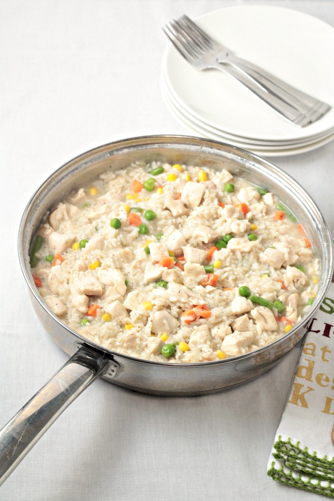 Chicken Rice Vegetable One Pan Dinner combines chicken breasts, broth, rice, and frozen mixed vegetables and is so fast it can be ready in about 25 minutes!