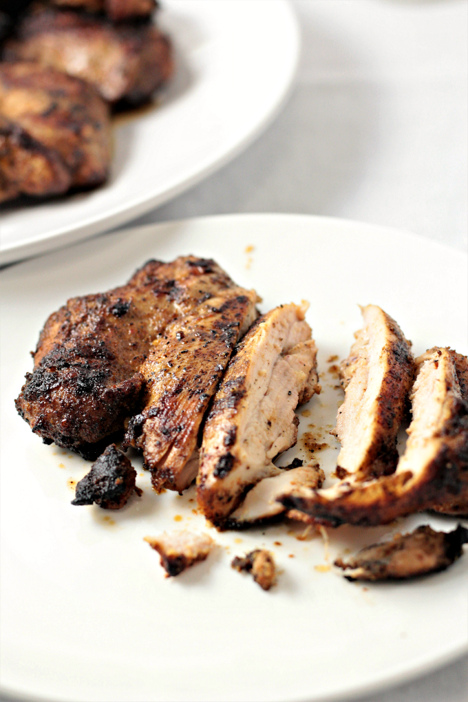 Chipotle Style Grilled Chicken Thighs are marinated in herbs and spices and then grilled to perfection. Great alone, in burritos, bowls, or tacos. 
