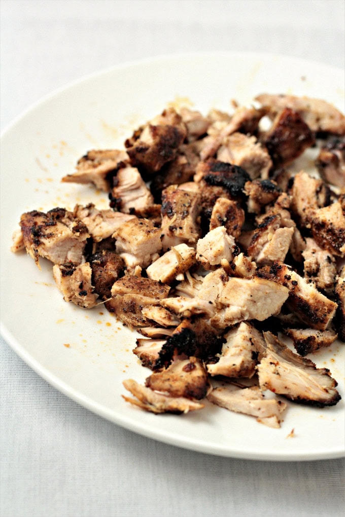 Chipotle Style Grilled Chicken Thighs are marinated in herbs and spices and then grilled to perfection. Great alone, in burritos, bowls, or tacos. 