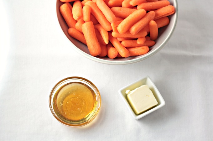 Honey Glazed Baby Carrots combine carrots, butter, and honey to make a delicious and healthy 3 ingredients vegetarian side dish the kids will love. 
