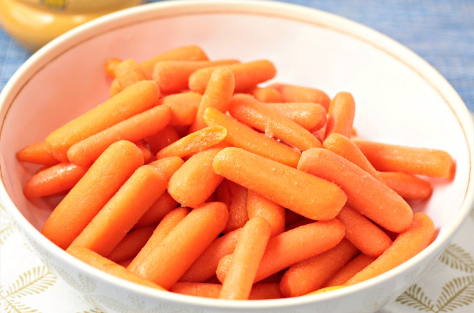 These Honey Glazed Baby Carrots couldn't be any easier! We basically love just about every vegetable at our house. I mean, they are so versatile and good for us. We make them savory or sweet, and cook them in many different ways.
