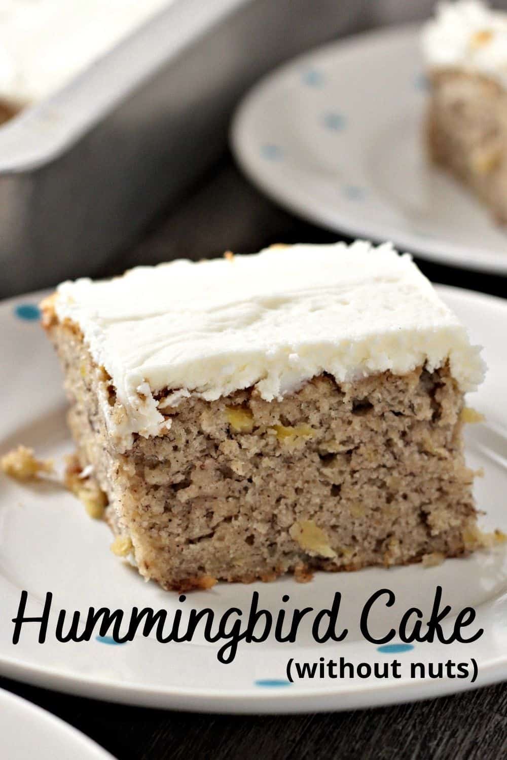 A close up view of a pice of hummingbird cake with the title at the bottom.