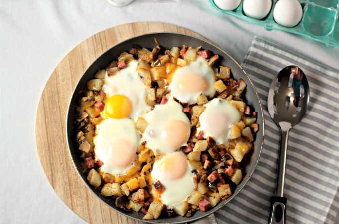 Ham Potato Skillet Breakfast features cubed potatoes and ham, green peppers, mushrooms, cheese and eggs. One pan and perfect for breakfast, lunch or dinner!