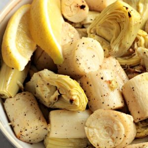 Roasted Hearts of Palm and Artichoke combines hearts of palm and artichoke with olive oil, garlic, lemon juice, salt and pepper. An easy vegan side dish.