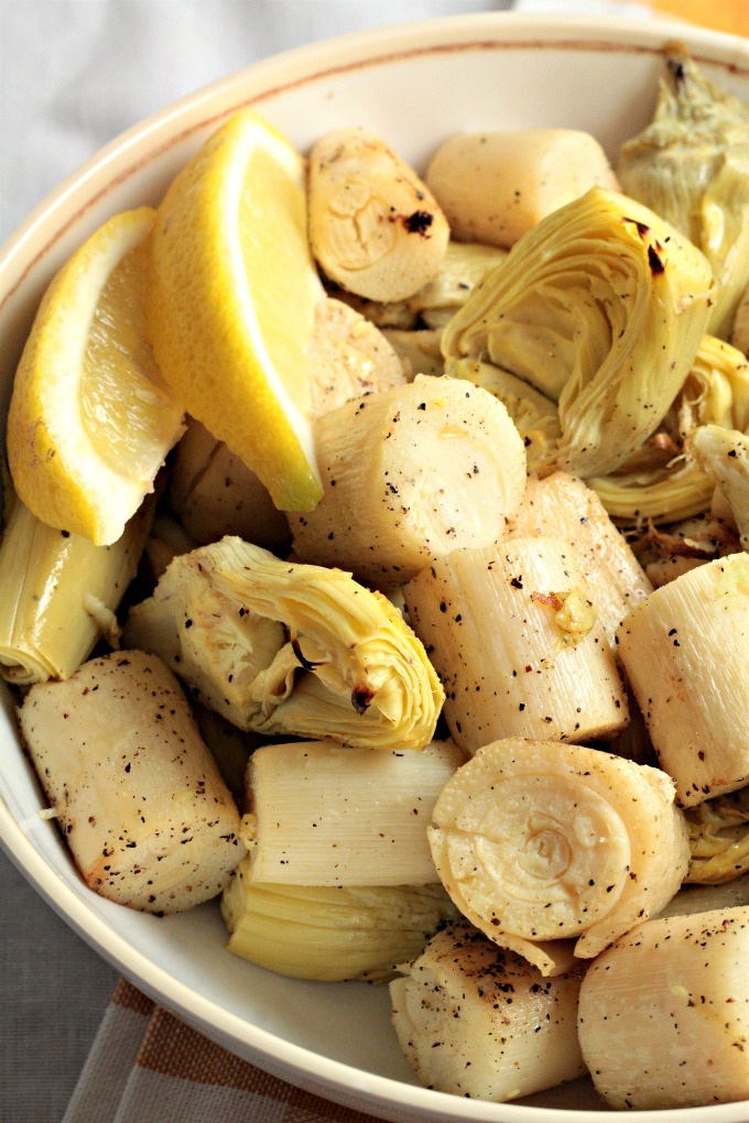 Roasted Hearts of Palm and Artichoke combines hearts of palm and artichoke with olive oil, garlic, lemon juice, salt and pepper. An easy vegan side dish. 