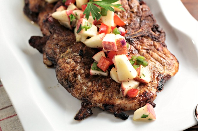 Spicy Grilled Pork Chops with Apple Salsa features marinated pork and an apple salsa made with fresh fruits and vegetables. Impressive and delicious!