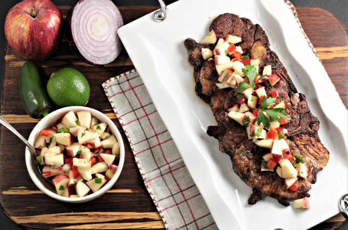 Spicy Grilled Pork Chops with Apple Salsa features marinated pork and an apple salsa made with fresh fruits and vegetables. Impressive and delicious!