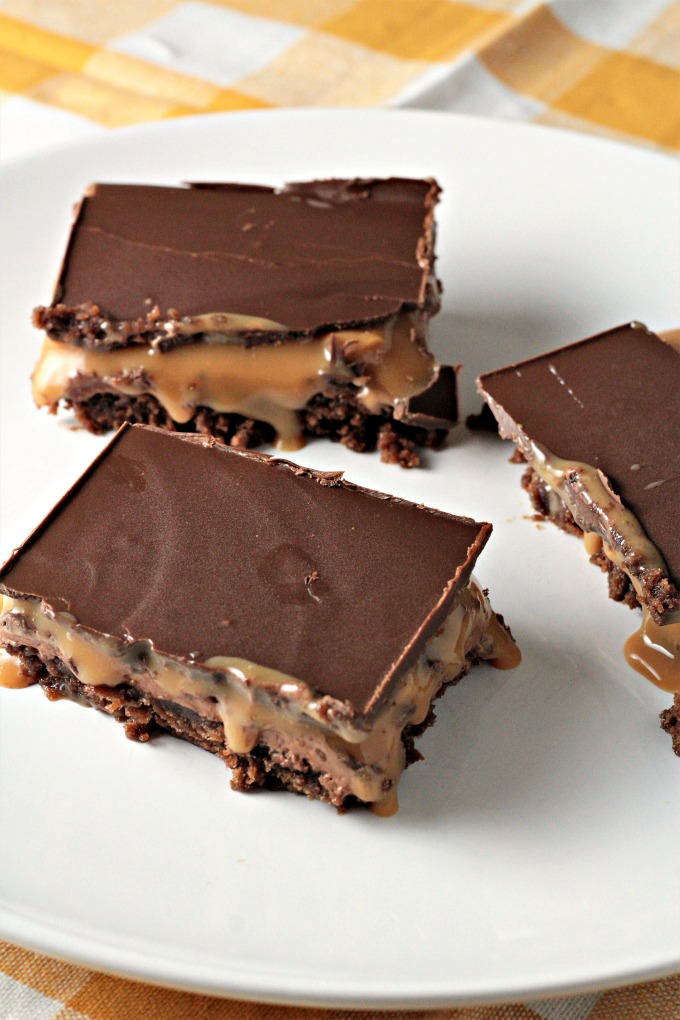 Milky Way Brownies feature boxed brownies topped with a layer of homemade nougat, a layer of caramel, and a layer of chocolate. A truly decadent treat!