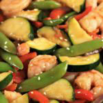 Sesame Ginger Teriyaki Shrimp Stir Fry combines fresh vegetables with shrimp, and Organic Seeds of Change Simmering Sauce for a delicious, quick, easy meal.