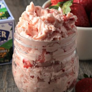 Whipped Strawberry Honey Butter combines butter, honey and fresh strawberries to make this classic fruit flavored butter. Easy delicious farm fresh food.