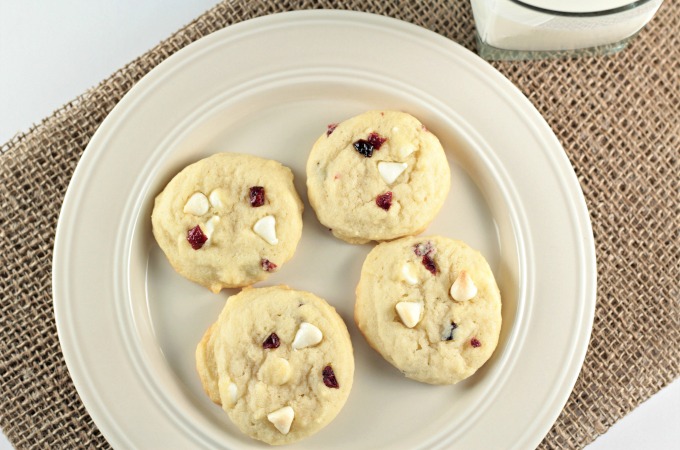 White Chocolate Chip Craisin Cookies feature sugar cookie dough with creamy white chocolate chipsand tart, sweet craisins. A delicious and satisfying treat!