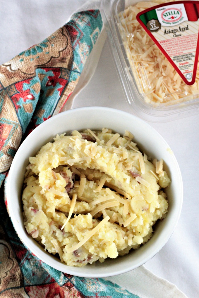 Asiago Garlic Mashed Potatoes combine red potatoes, authentic cheese, garlic, butter, milk, salt and pepper to make an easy and delicious side dish. 