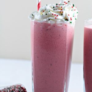 Red Velvet Milkshake combines ice cream and milk to make a delicious and creamy homemade shake. Top with whipped cream for a restaurant style treat!