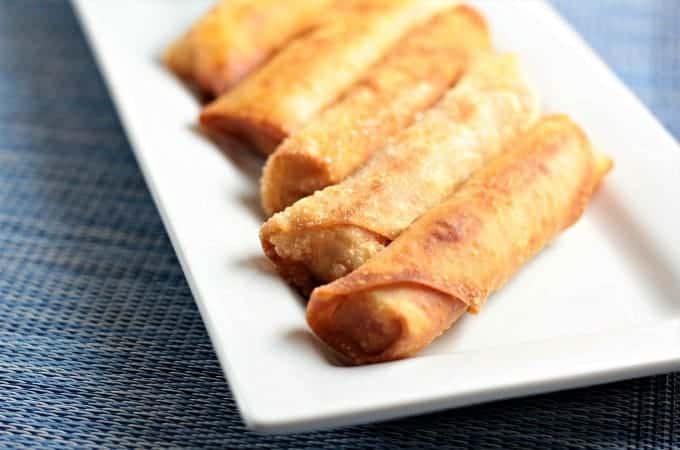 Pepperoni Pizza Egg Rolls feature mozzarella string cheese, sliced pepperoni and Italian seasoning wrapped in an egg roll wrapper and the deep fried to perfection. This is an easy and fun appetizer or snack great for kids and adults alike. Mindy's Cooking Obsession